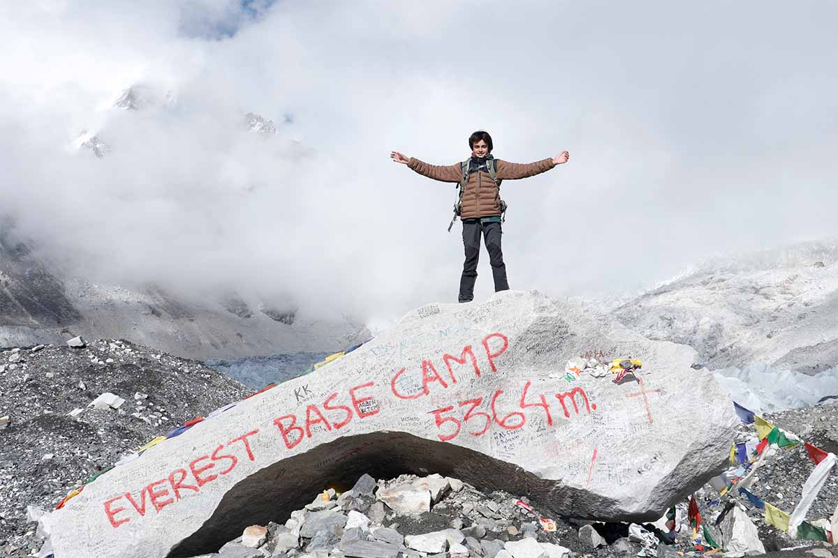 Young trekker celebrates reaching Everest Base Camp at 5,364m